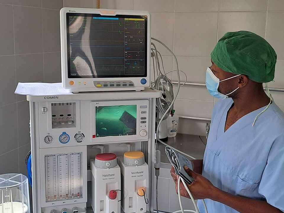 A health worker with donated medical equipment at Saint Camillus Mission Hospital, Karungu
