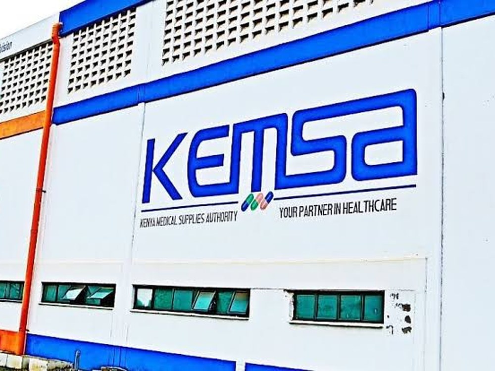 The KEMSA logo on the side of the authority's warehouse building